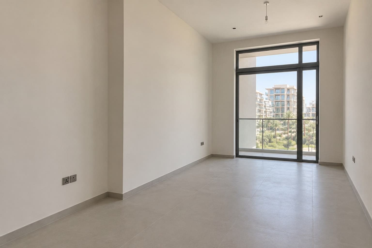 An empty, unfurnished studio apartment